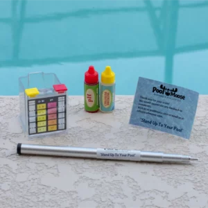 Full extendable pool test kit laid out on the pool edge